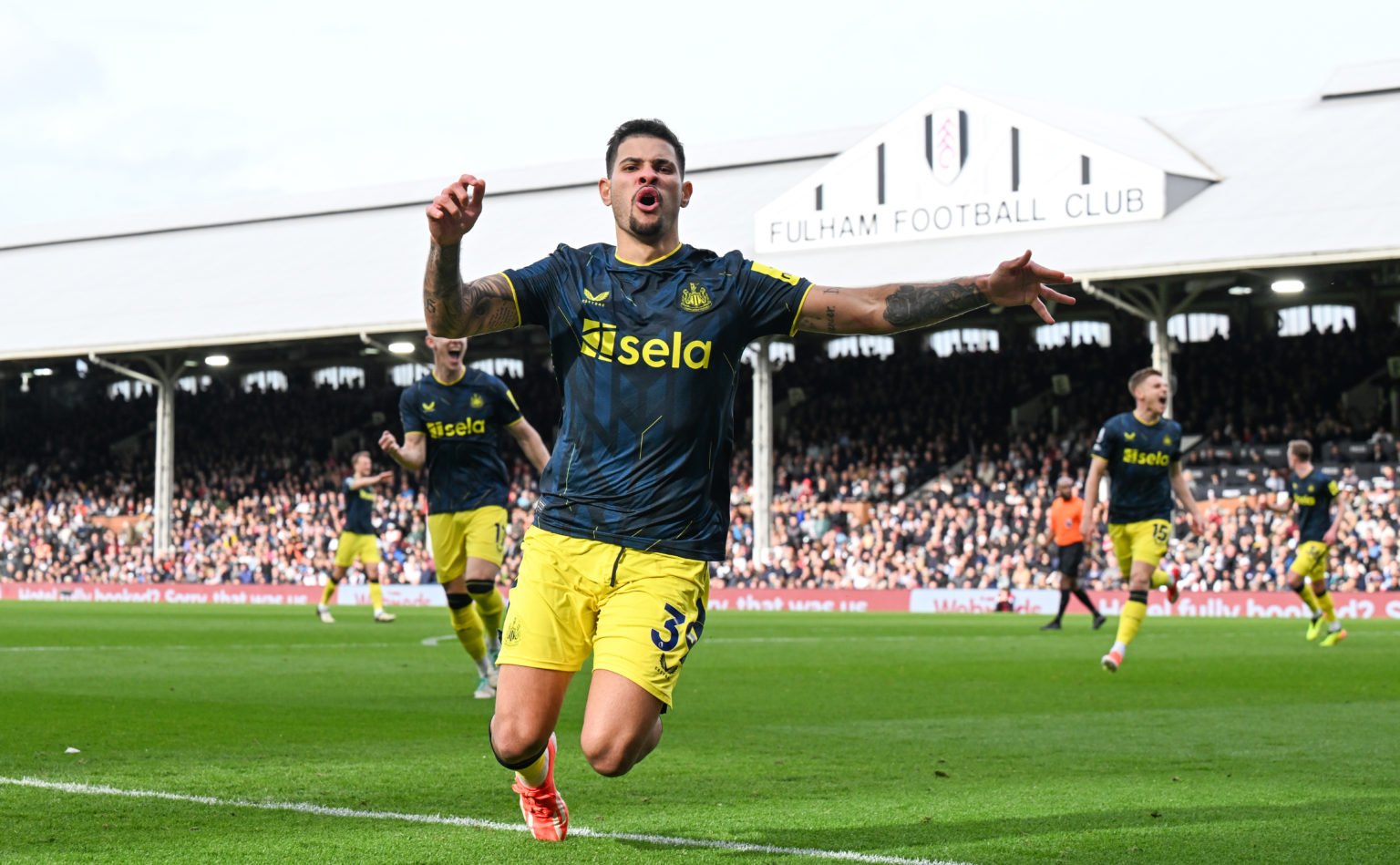 Bruno Guimaraes of Newcastle United (39) celebrates after scoring during the Premier League match between Fulham FC and Newcastle United at Craven ...