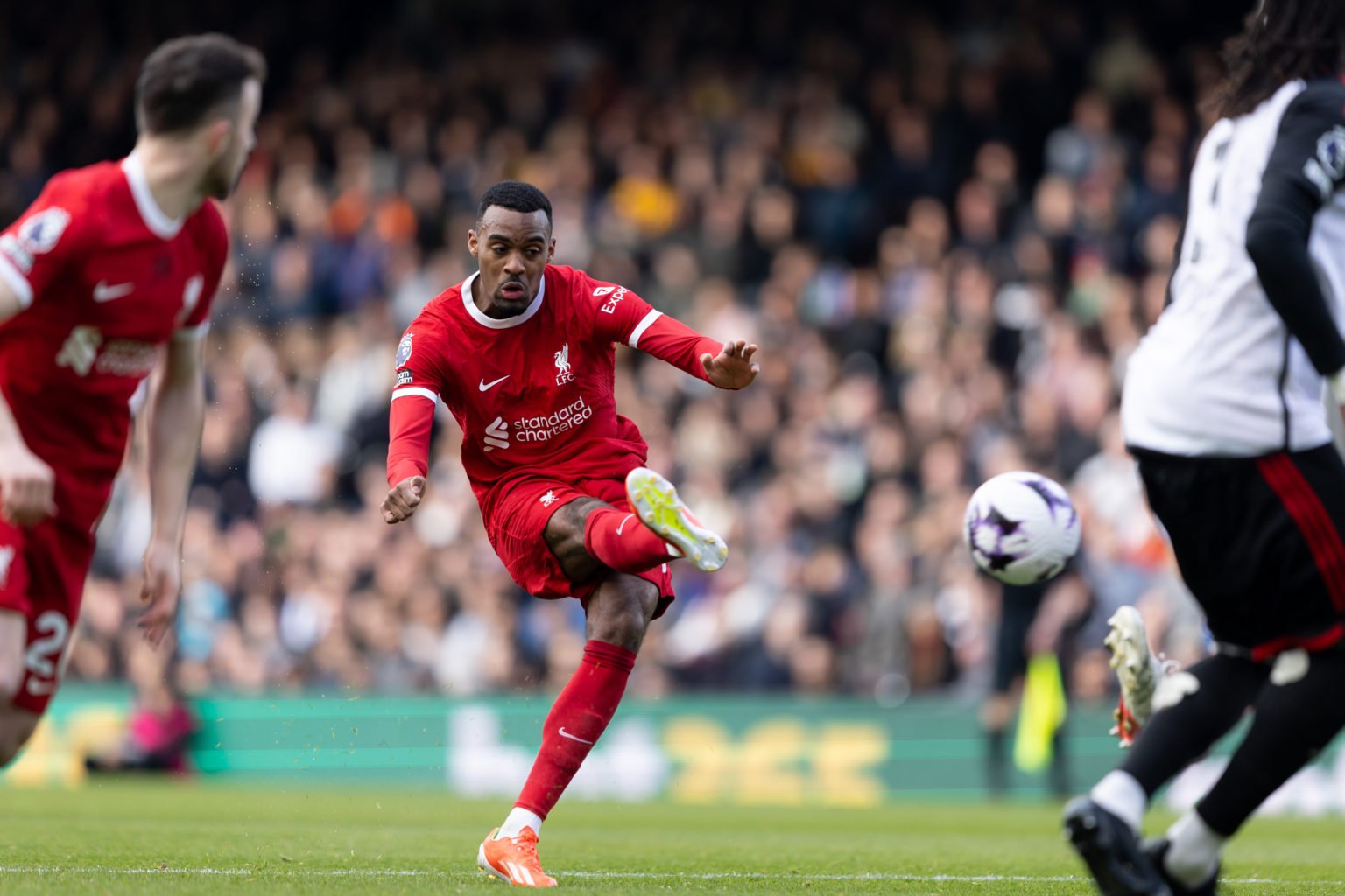 Ryan Gravenberch of Liverpool shoots to score his side's second goal during the Premier League match between Fulham FC and Liverpool FC at Craven C...