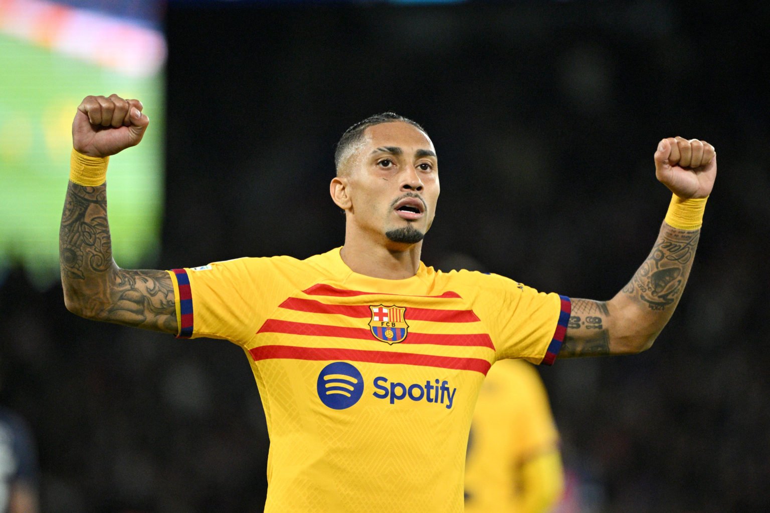 Raphinha of FC Barcelona celebrates after scoring the team's first goal during the UEFA Champions League quarter-final first leg match between Pari...