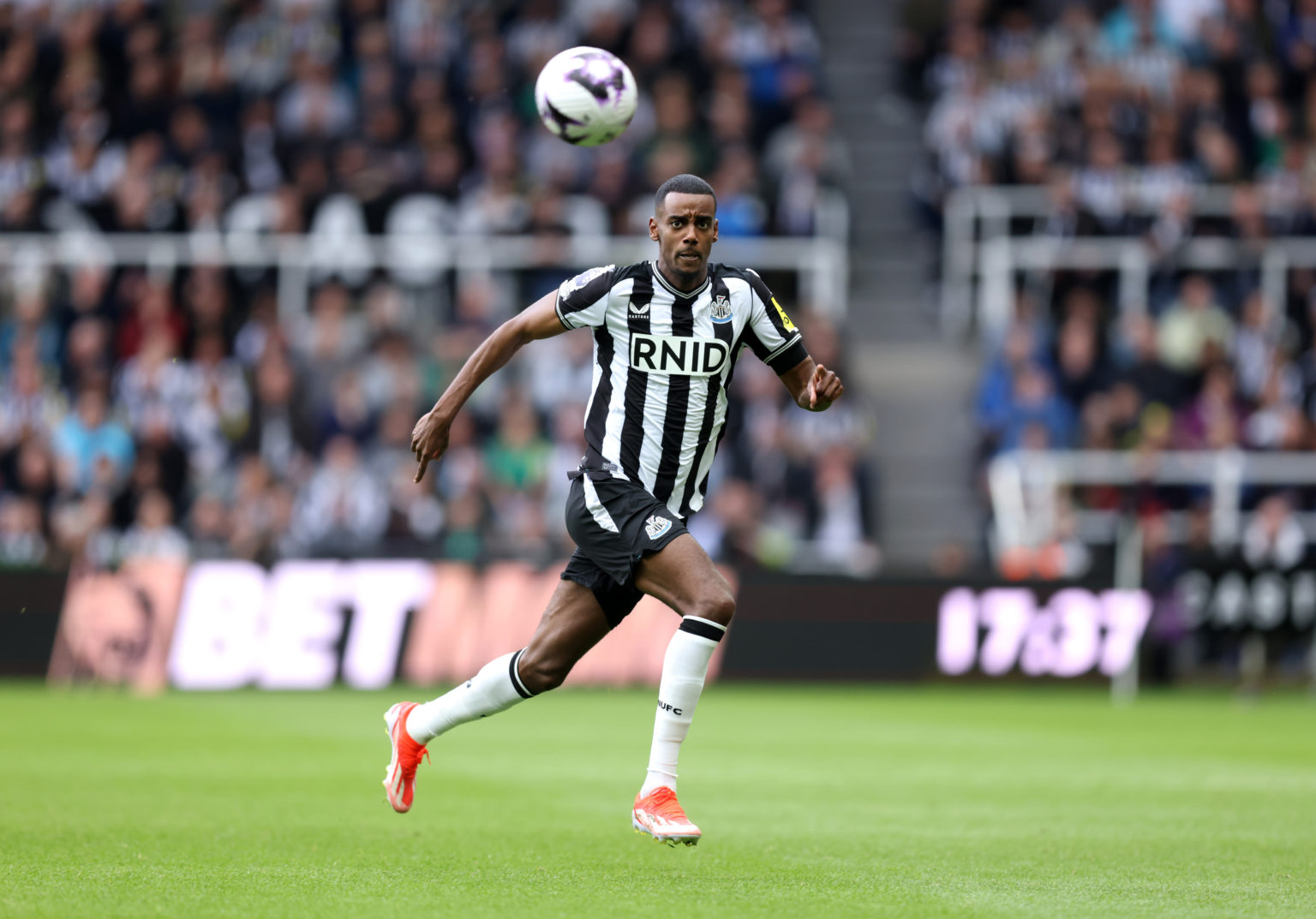 Alexander Isak of Newcastle United chases the ball during the Premier League match between Newcastle United and Tottenham Hotspur at St. James Park...