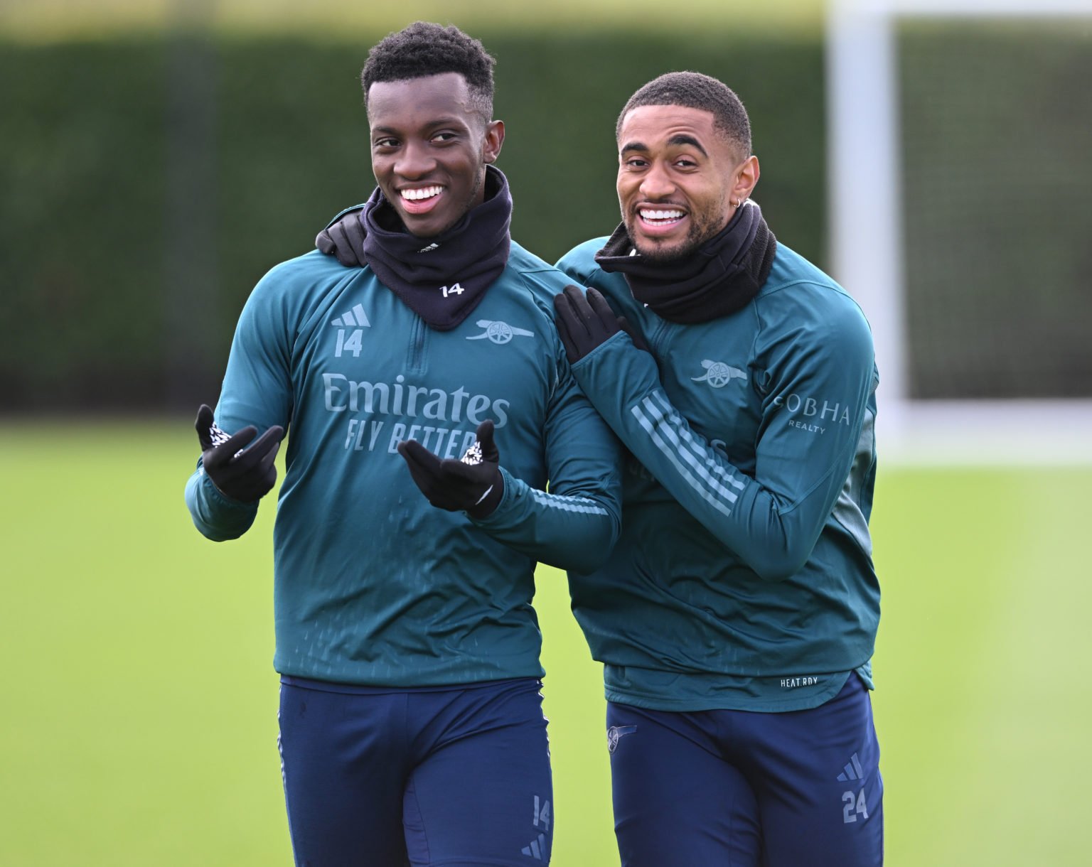 (L-R) Eddie Nketiah and Reiss Nelson of Arsenal during a training session at Sobha Realty Training Centre on APRIL 16, 2024 in London Colney, England.