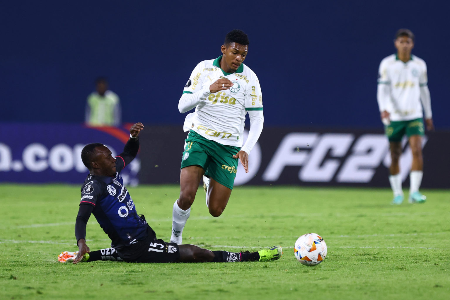 Luis Guilherme of Palmeiras battles for the ball with Richard Schunke of Independiente del Valle during a Copa CONMEBOL Libertadores Group F match ...