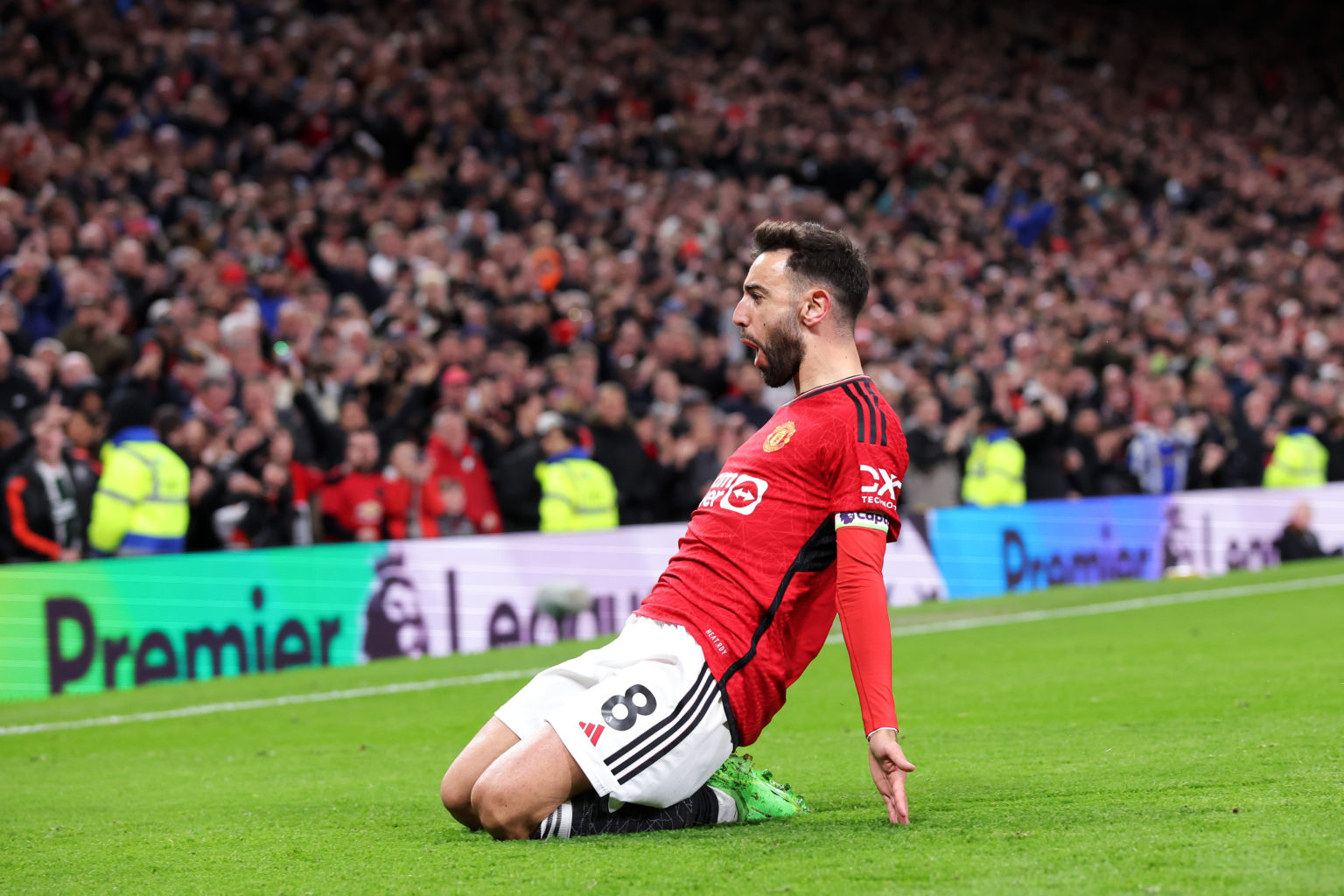 Bruno Fernandes of Manchester United celebrates scoring his team's third goal during the Premier League match between Manchester United and Sheffie...