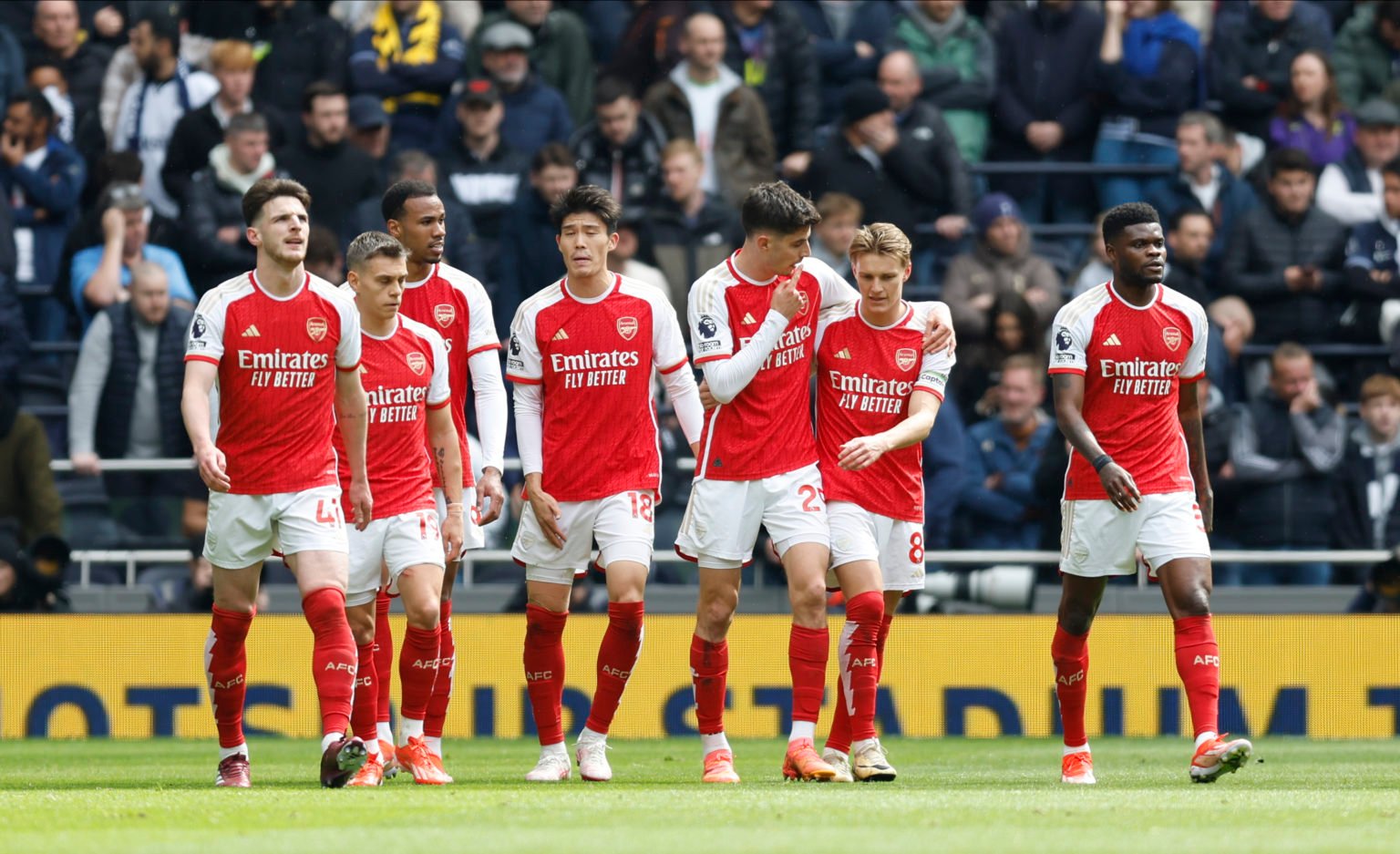 Kai Havertz and Martin Odegaard of Arsenal celebrates 3rd goal with team mates during the Premier League match between Tottenham Hotspur and Arsena...