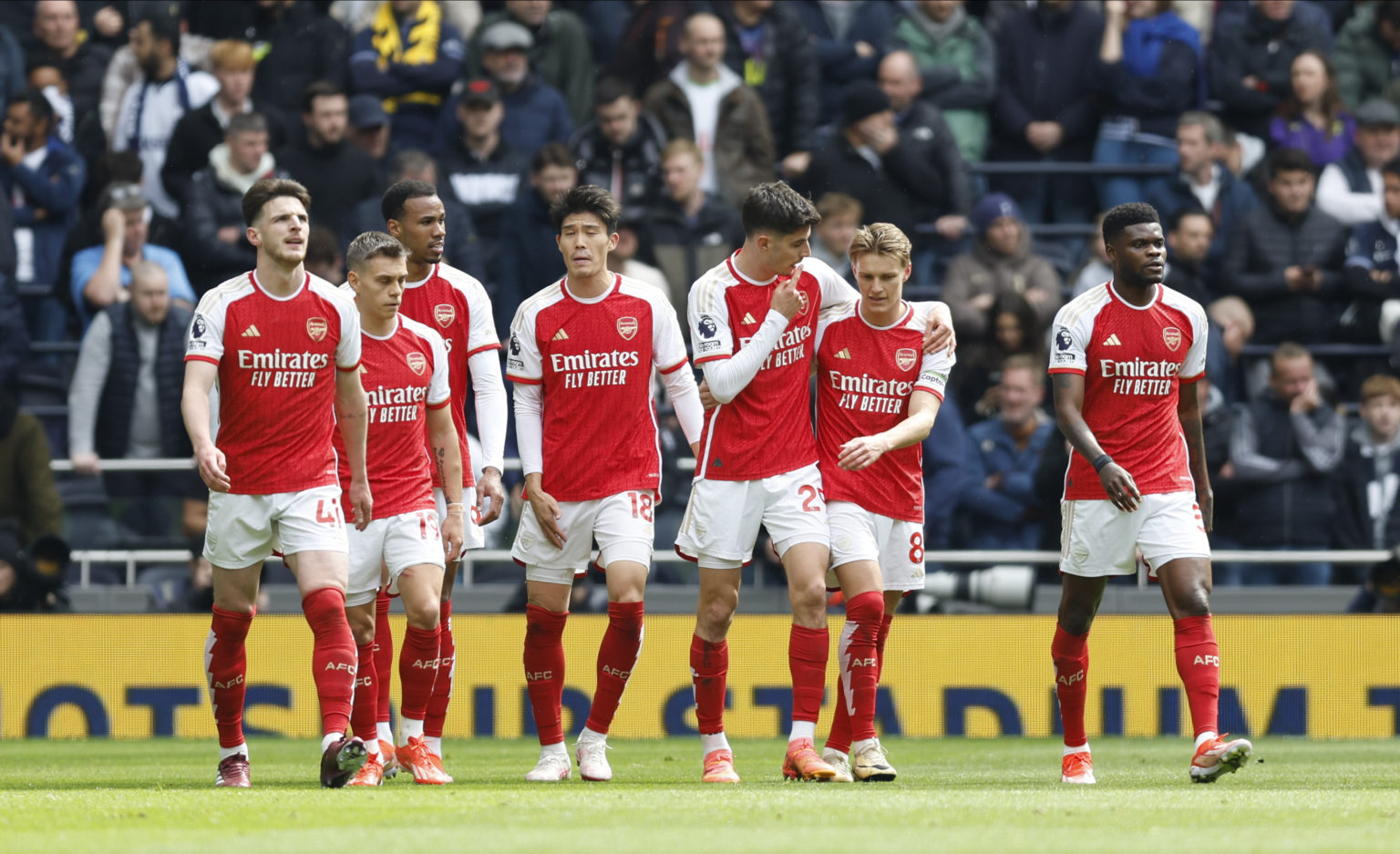 Kai Havertz and Martin Odegaard of Arsenal celebrates 3rd goal with team mates during the Premier League match between Tottenham Hotspur and Arsena...