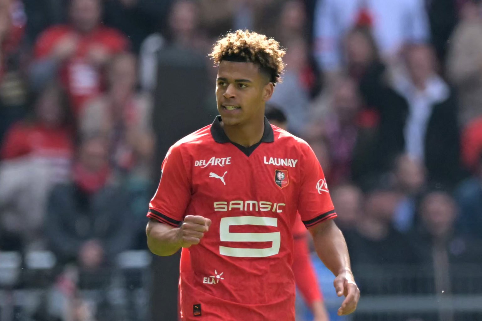 Rennes' French midfielder #33 Desire Doue reacts during the French L1 football match between FC Lorient and Toulouse FC at Stade du Moustoir in Lor...