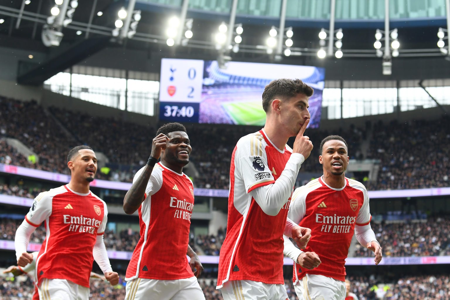 Kai Havertz celebrates scoring his team's third goal with William Saliba, Thomas Partey and Gabriel of Arsenal during the Premier League match betw...