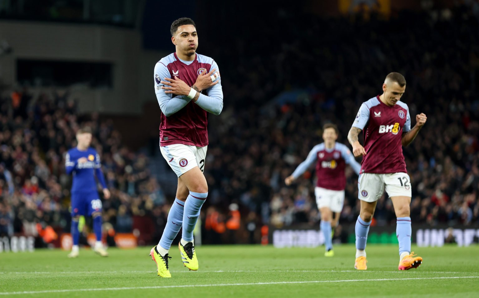 Morgan Rogers of Aston Villa celebrates his goal during the Premier League match between Aston Villa and Chelsea FC at Villa Park on April 27, 2024...