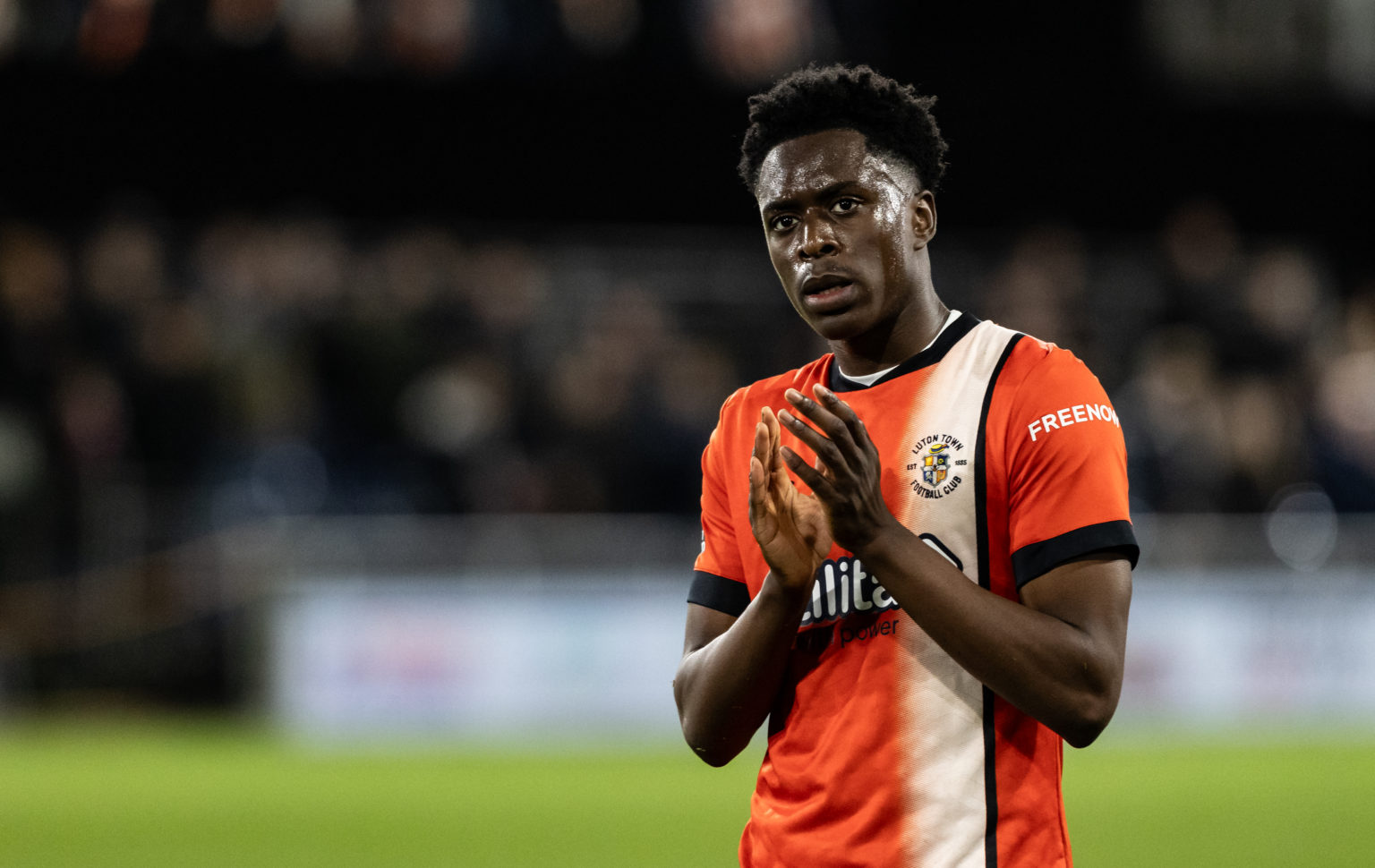 Luton Town's Albert Sambi Lokonga applauds his side's supporters at the end of the match during the Premier League match between Luton Town and Eve...