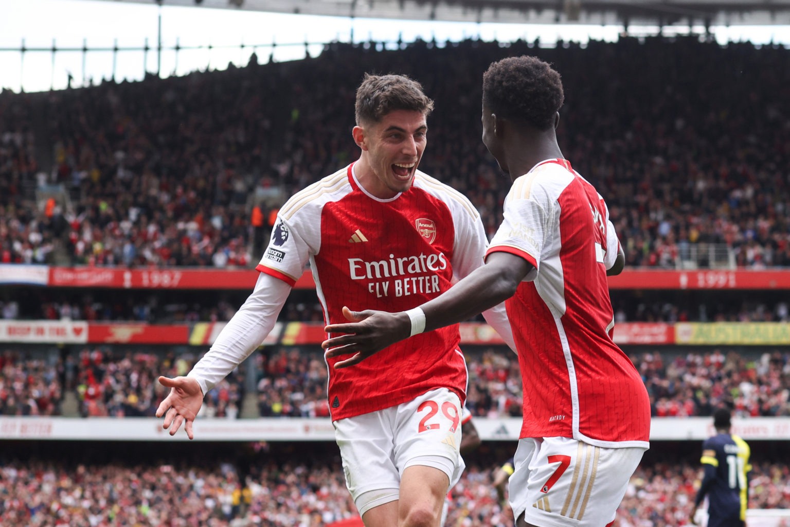 Kai Havertz of Arsenal celebrates their first goal with Bukayo Saka of Arsenal during the Premier League match between Arsenal FC and AFC Bournemou...