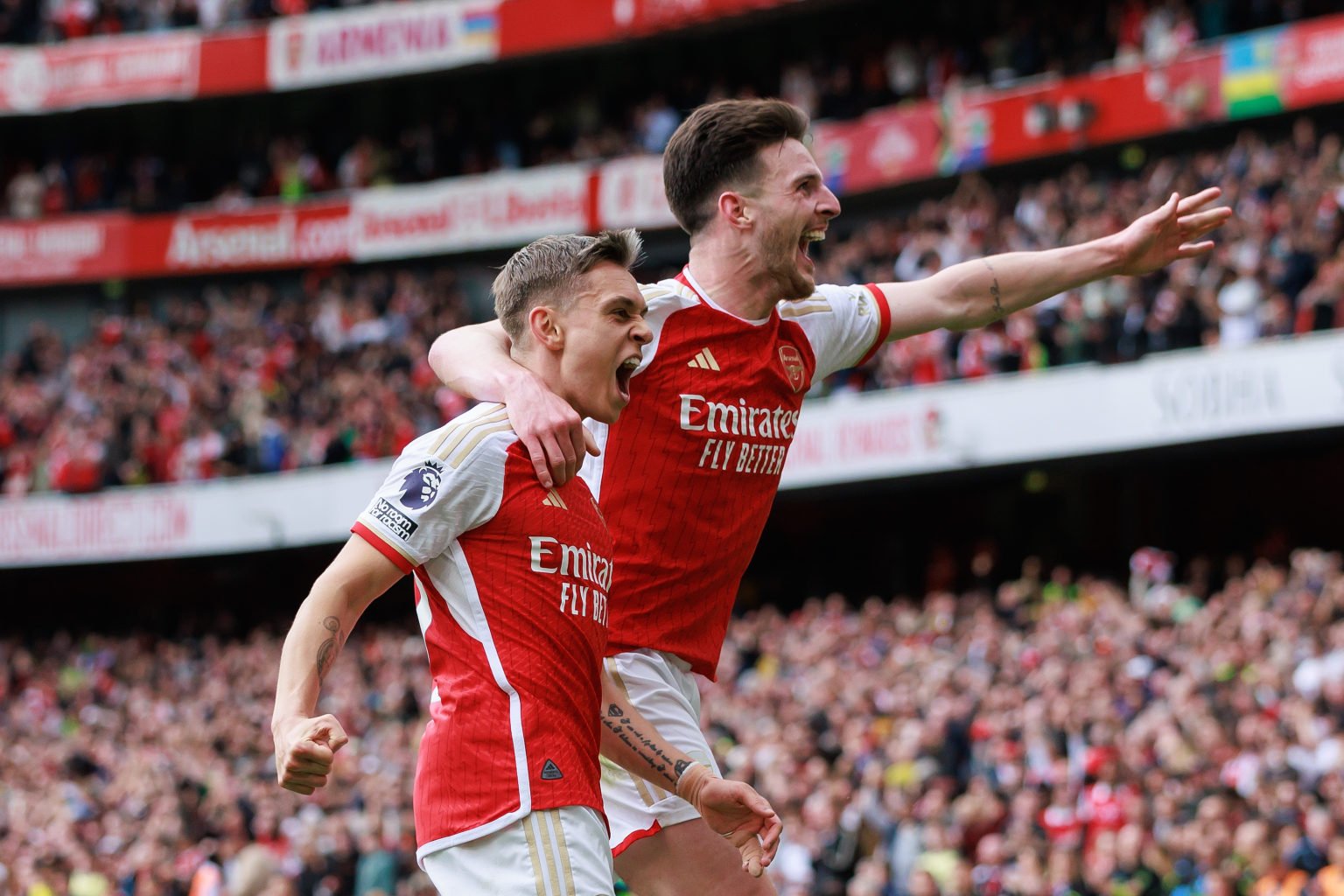 Leandro Trossard of Arsenal celebrates scoring the second goal with Declan Rice during the Premier League match between Arsenal FC and AFC Bournemo...