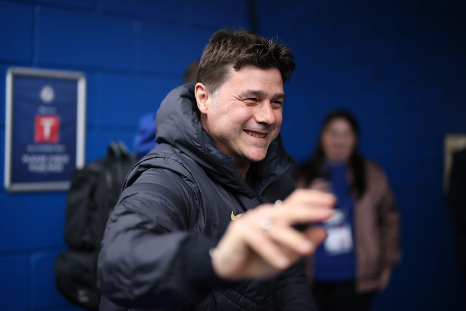 Mauricio Pochettino, Manager of Chelsea, acknowledges the fans as he arrives at the stadium prior to the Premier League match between Chelsea FC an...