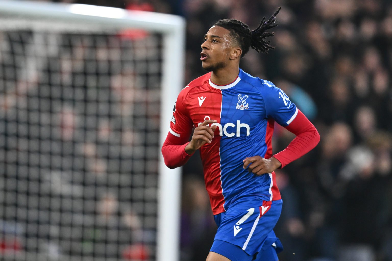 Michael Olise of Crystal Palace celebrates after scoring his team's first goal during the Premier League match between Crystal Palace and Mancheste...