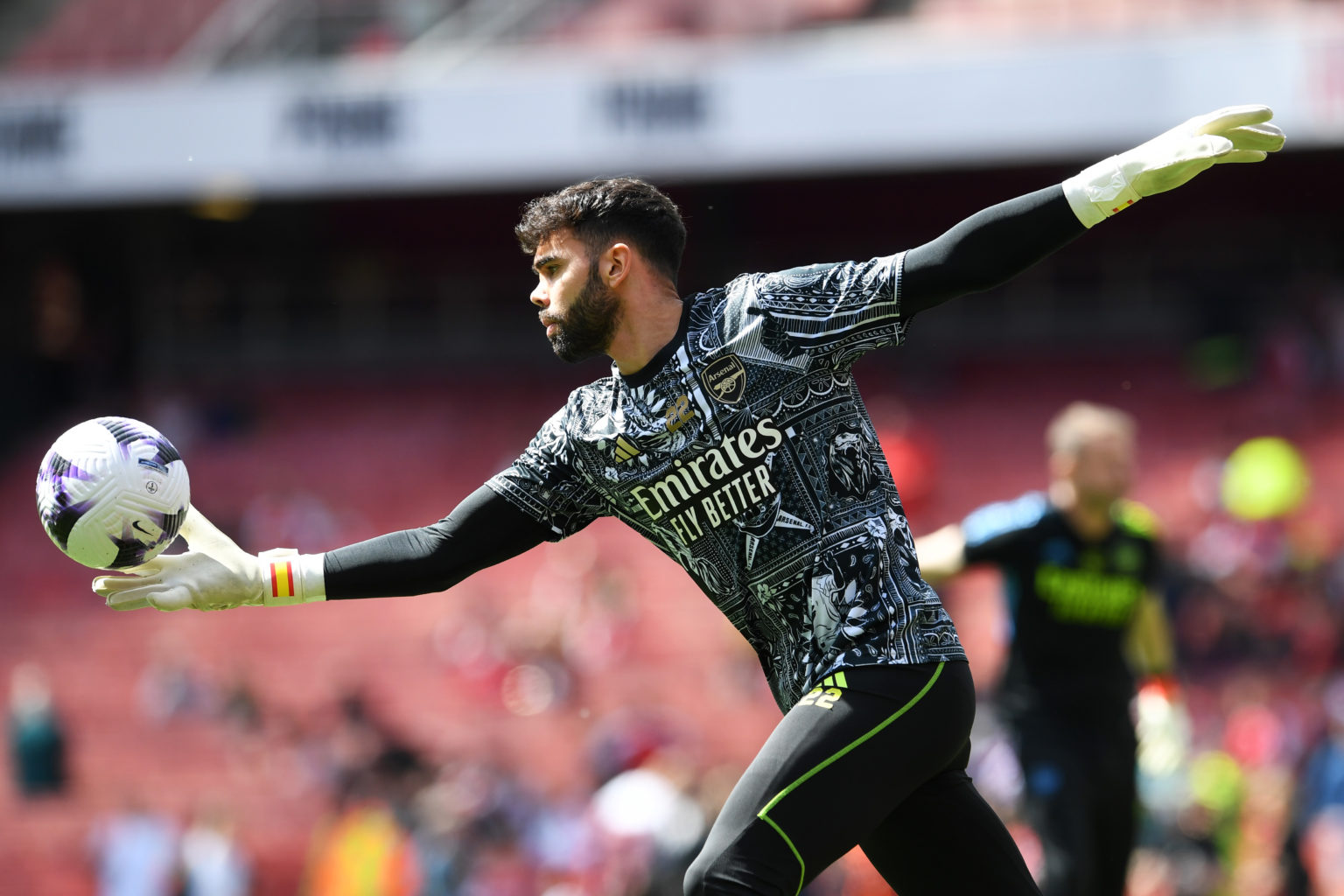 David Raya of Arsenal warms up prior to the Premier League match between Arsenal FC and AFC Bournemouth at Emirates Stadium on May 04, 2024 in Lond...