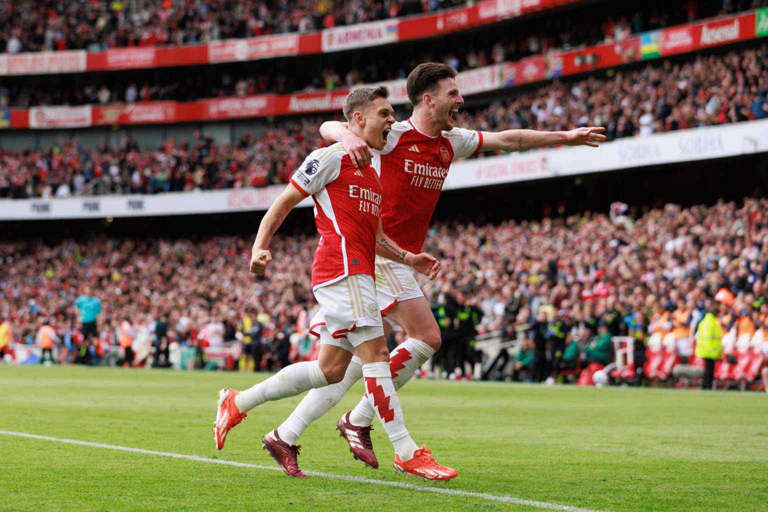 Leandro Trossard of Arsenal celebrates with Declan Rice during the Premier League match between Arsenal FC and AFC Bournemouth at Emirates Stadium ...