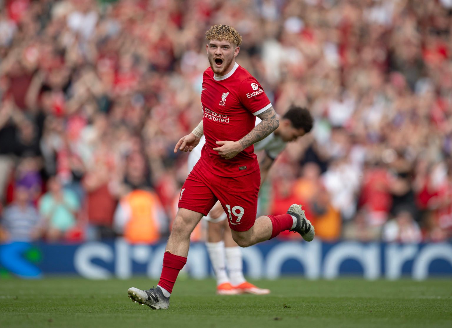 Harvey Elliott of Liverpool celebrates scoring during the Premier League match between Liverpool FC and Tottenham Hotspur at Anfield on May 5, 2024...