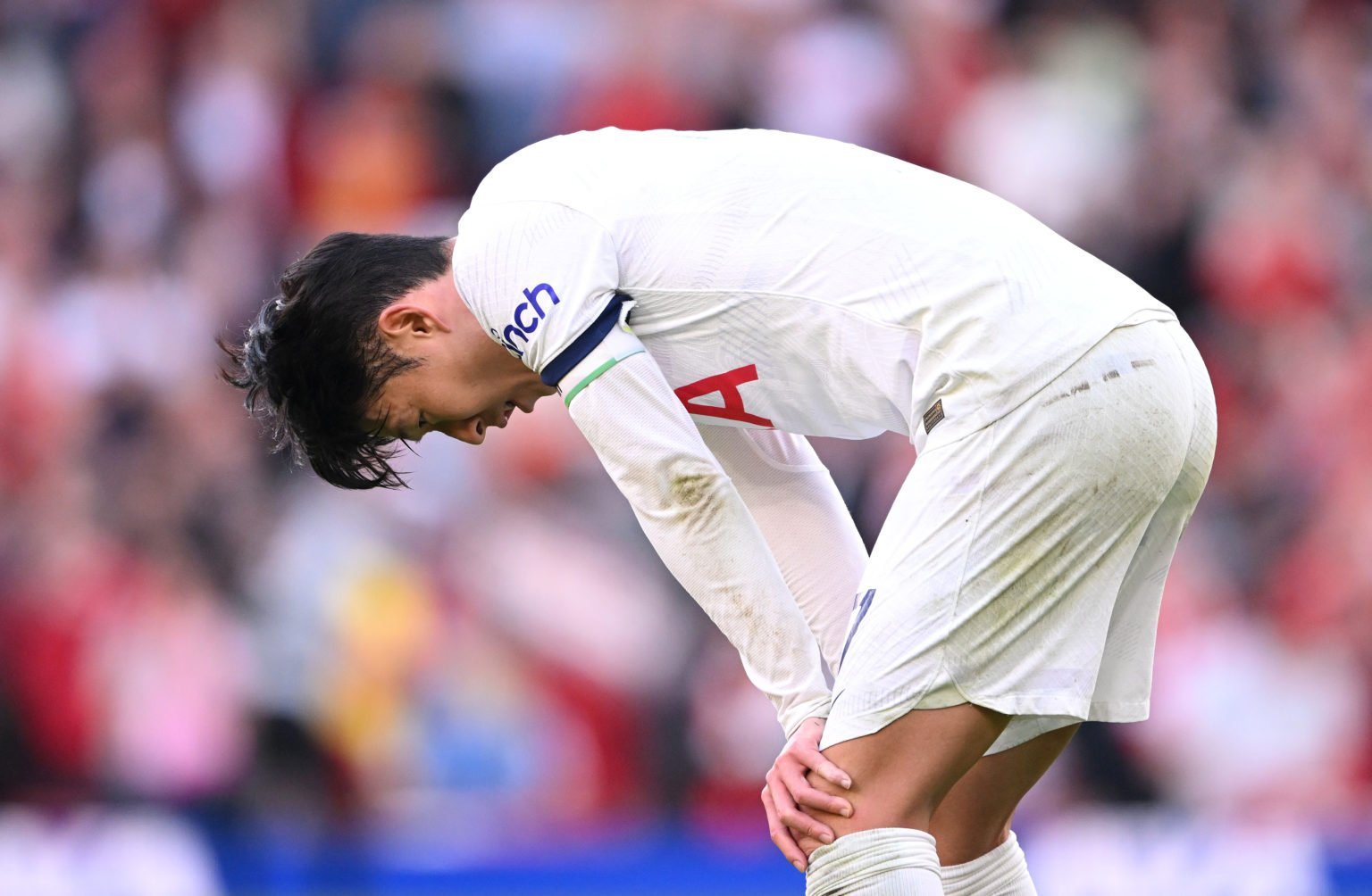 Son Heung-Min of Tottenham Hotspur reacts dejectedly following the team's defeat during the Premier League match between Liverpool FC and Tottenham...