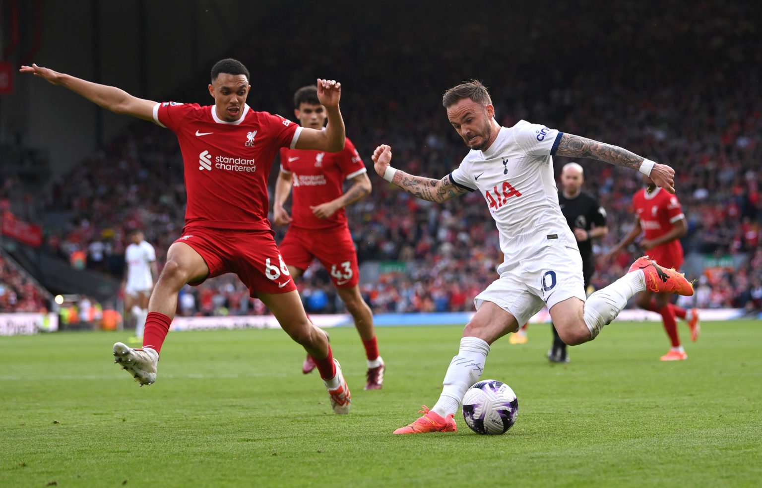 James Maddison of Tottenham attempts to cross challenged by Trent Alexander-Arnold of Liverpool during the Premier League match between Liverpool F...