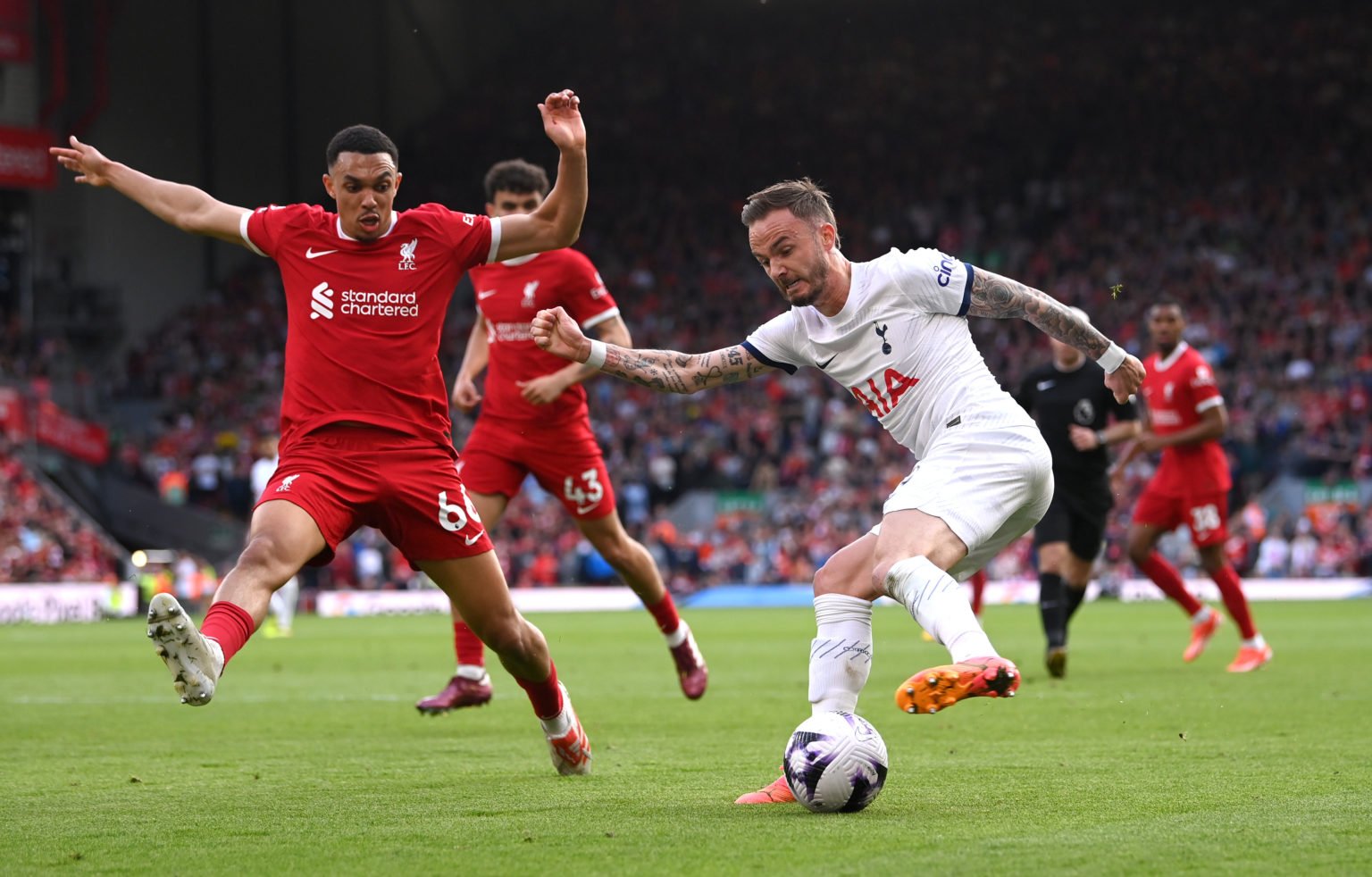 James Maddison of Tottenham attempts to cross challenged by Trent Alexander-Arnold of Liverpool during the Premier League match between Liverpool F...