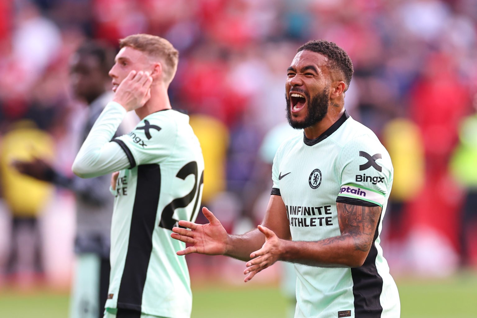 Reece James of Chelsea celebrates at full time during the Premier League match between Nottingham Forest and Chelsea FC at City Ground on May 11, 2...