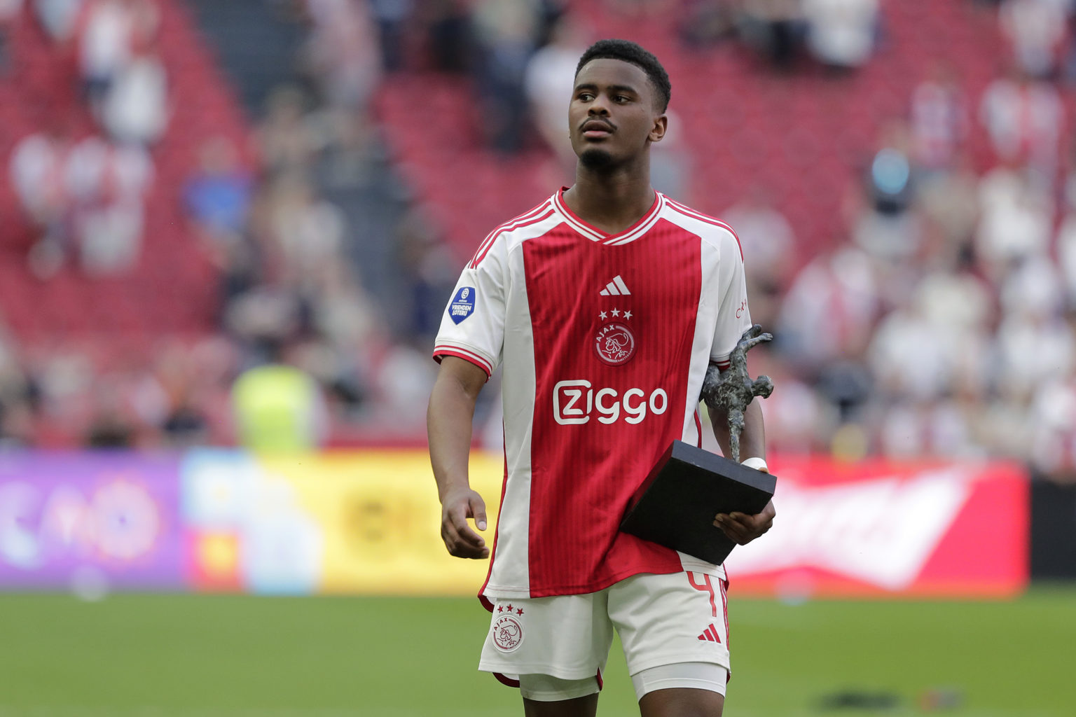 Jorrel Hato of Ajax with the Marco van Basten best talent of the year trophy during the Dutch Eredivisie  match between Ajax v Almere City at the J...