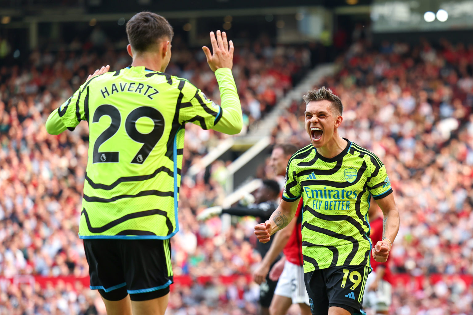 Leandro Trossard of Arsenal celebrates after scoring a goal to make it 0-1 during the Premier League match between Manchester United and Arsenal FC...