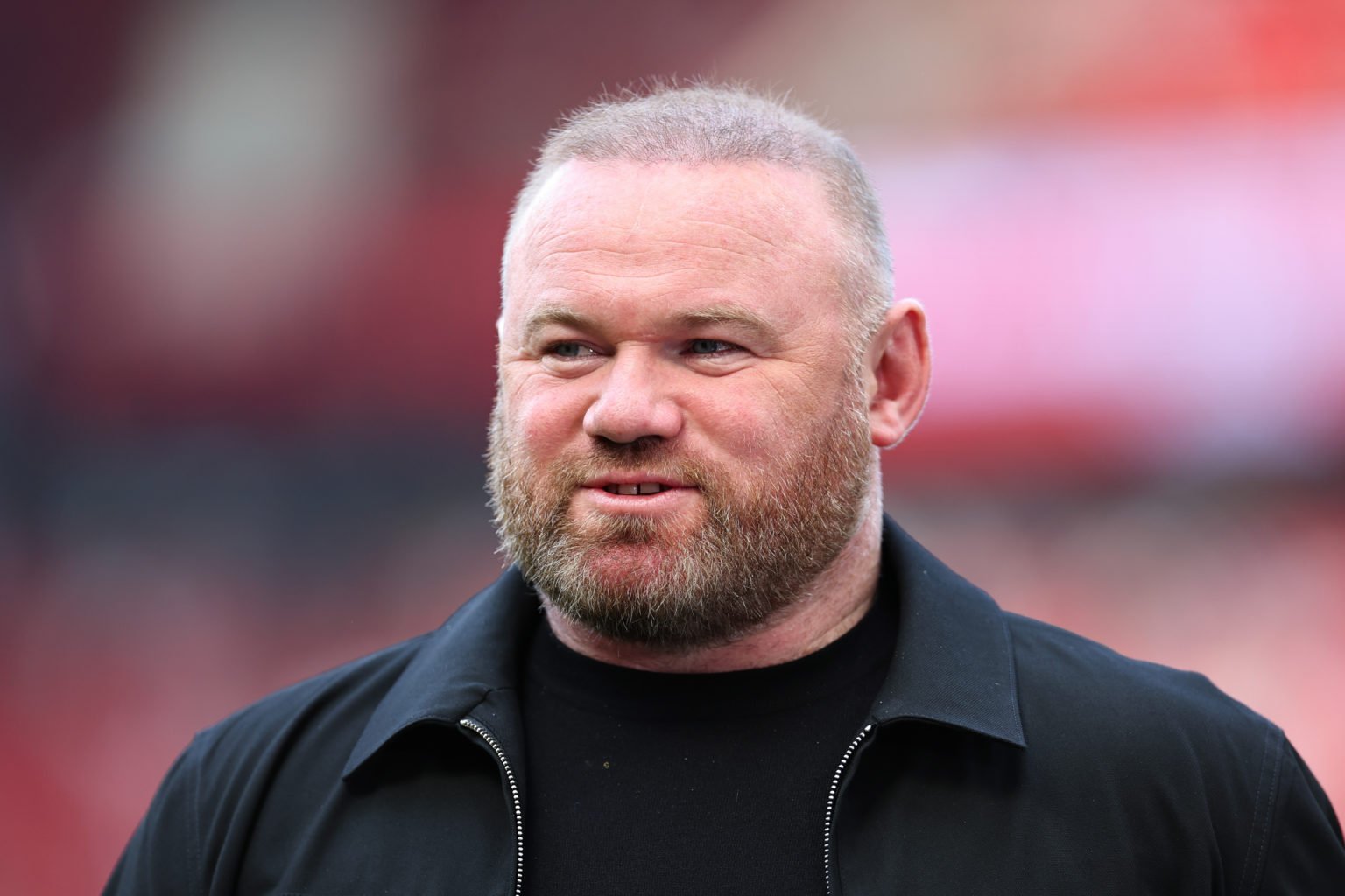 Wayne Rooney, working as a pundit for Sky Sports during the Premier League match between Manchester United and Arsenal FC at Old Trafford on May 12...