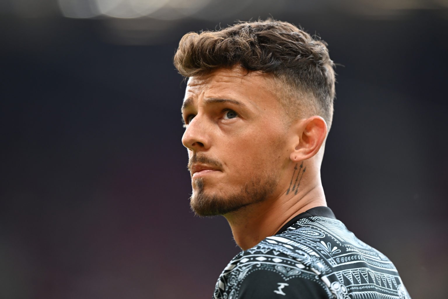 Ben White of Arsenal looks on as he warms up prior to the Premier League match between Manchester United and Arsenal FC at Old Trafford on May 12, ...