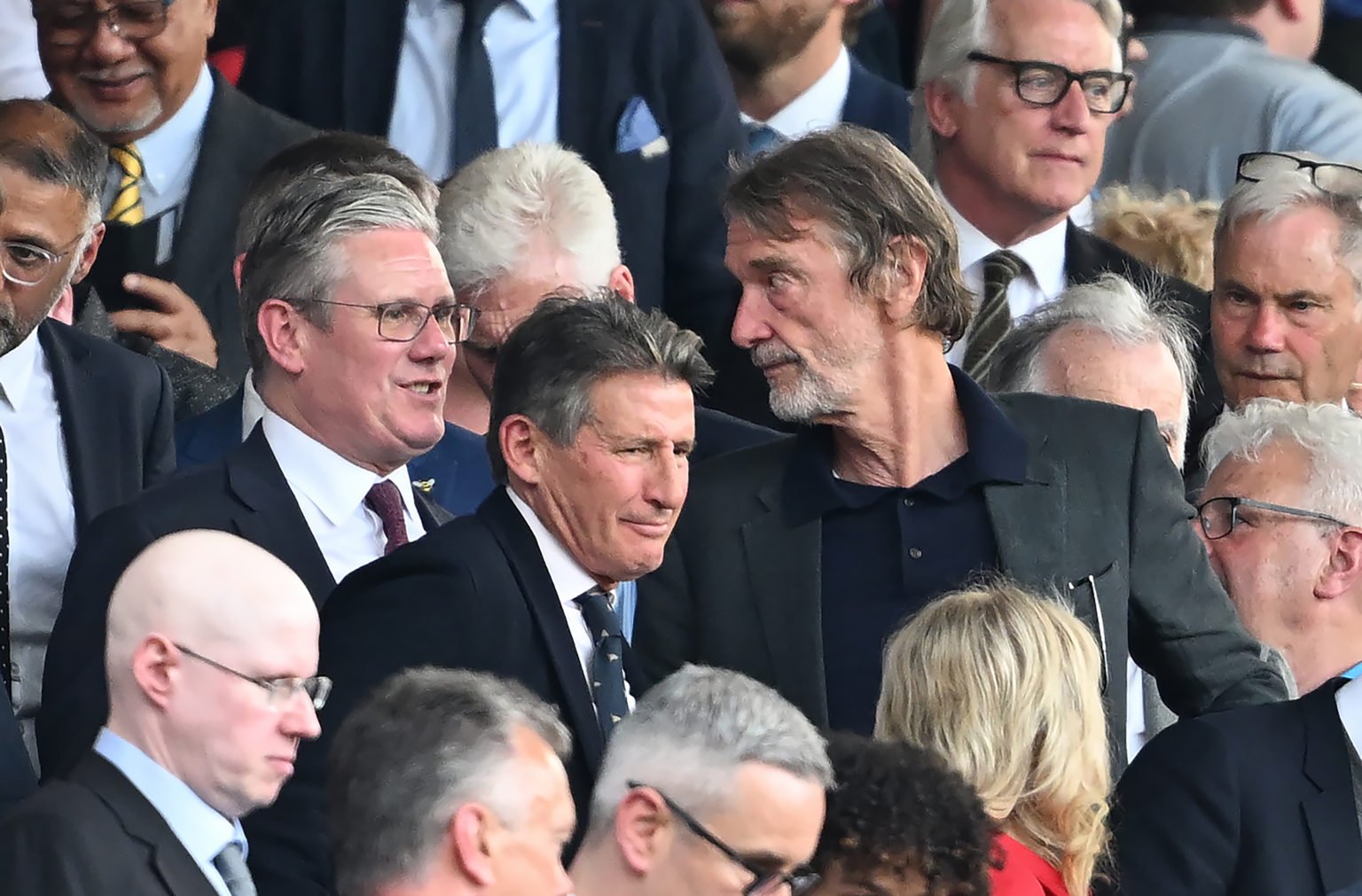 Sebastian Coe, Baron Coe, speaks with Sir James Ratcliffe, Minority Shareholder of Manchester United, and Sir Keir Starmer, Leader of the Oppositio...