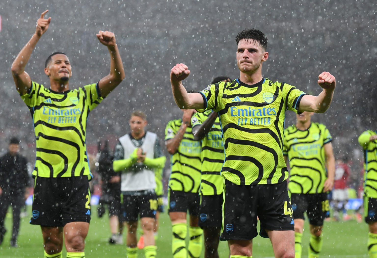 Arsenal's Declan Rice celebrates after the Premier League match between Manchester United and Arsenal FC at Old Trafford on May 12, 2024 in Manches...