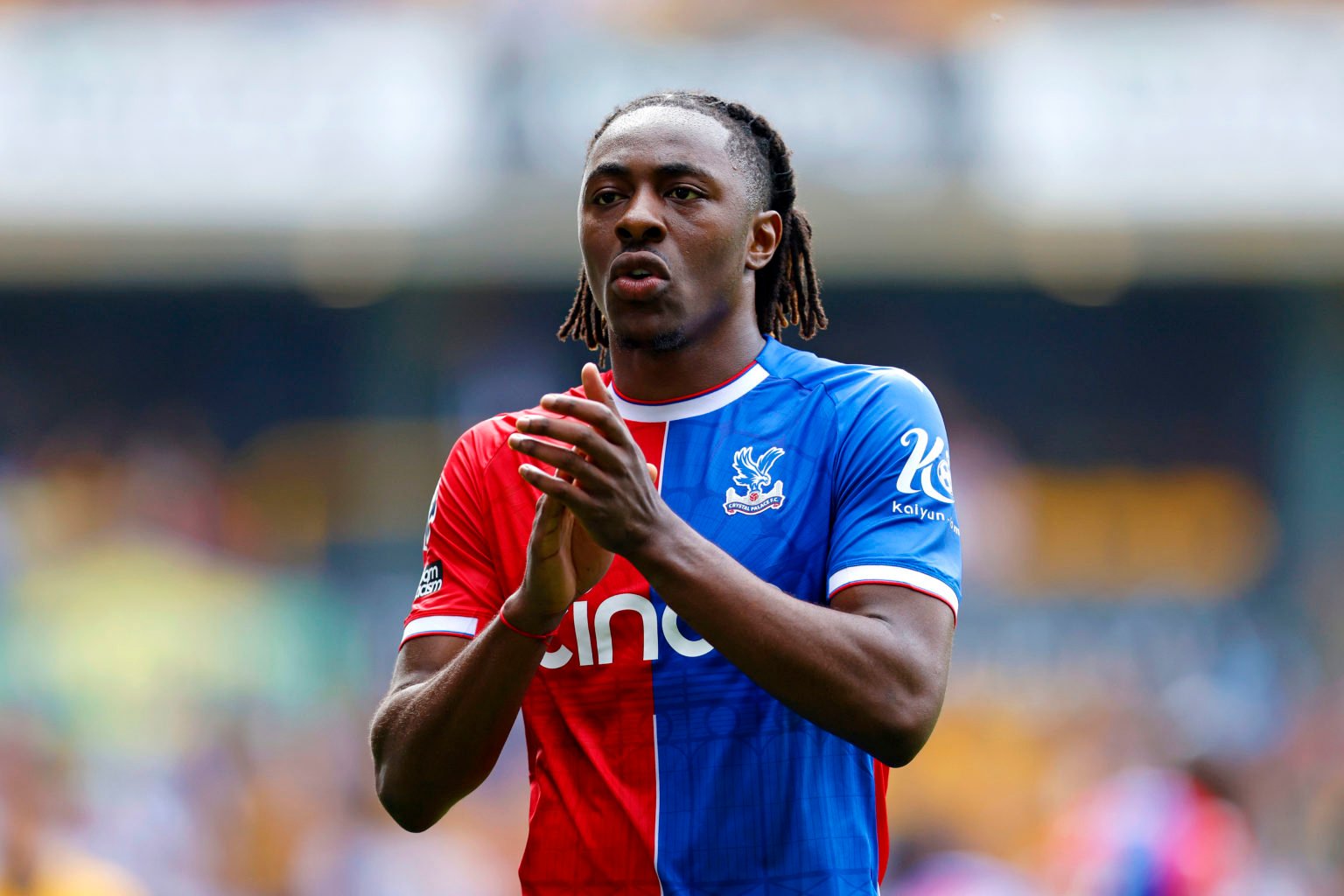 Eberechi Eze of Crystal Palace applauds the supporters following the Premier League match between Wolverhampton Wanderers and Crystal Palace at Mol...