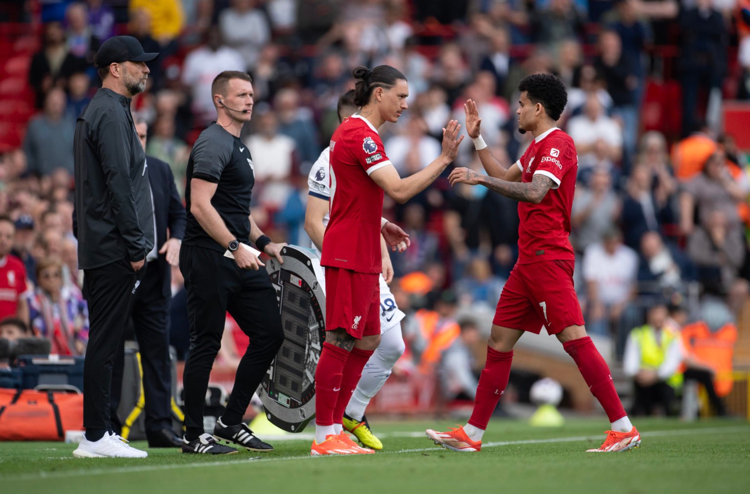 Luis Diaz of Liverpool is greeted by Darwin Nunez and manager Jurgen Klopp after being substituted during the Premier League match between Liverpoo...