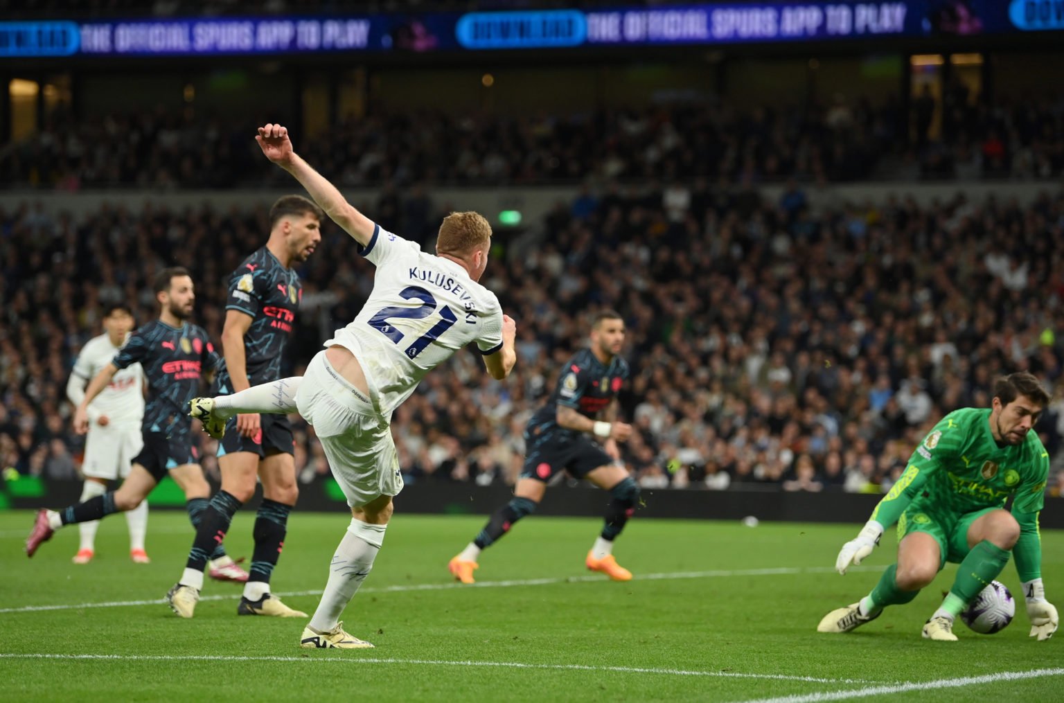 Dejan Kulusevski of Tottenham Hotspur takes a shot which is saved by Stefan Ortega of Manchester City during the Premier League match between Totte...