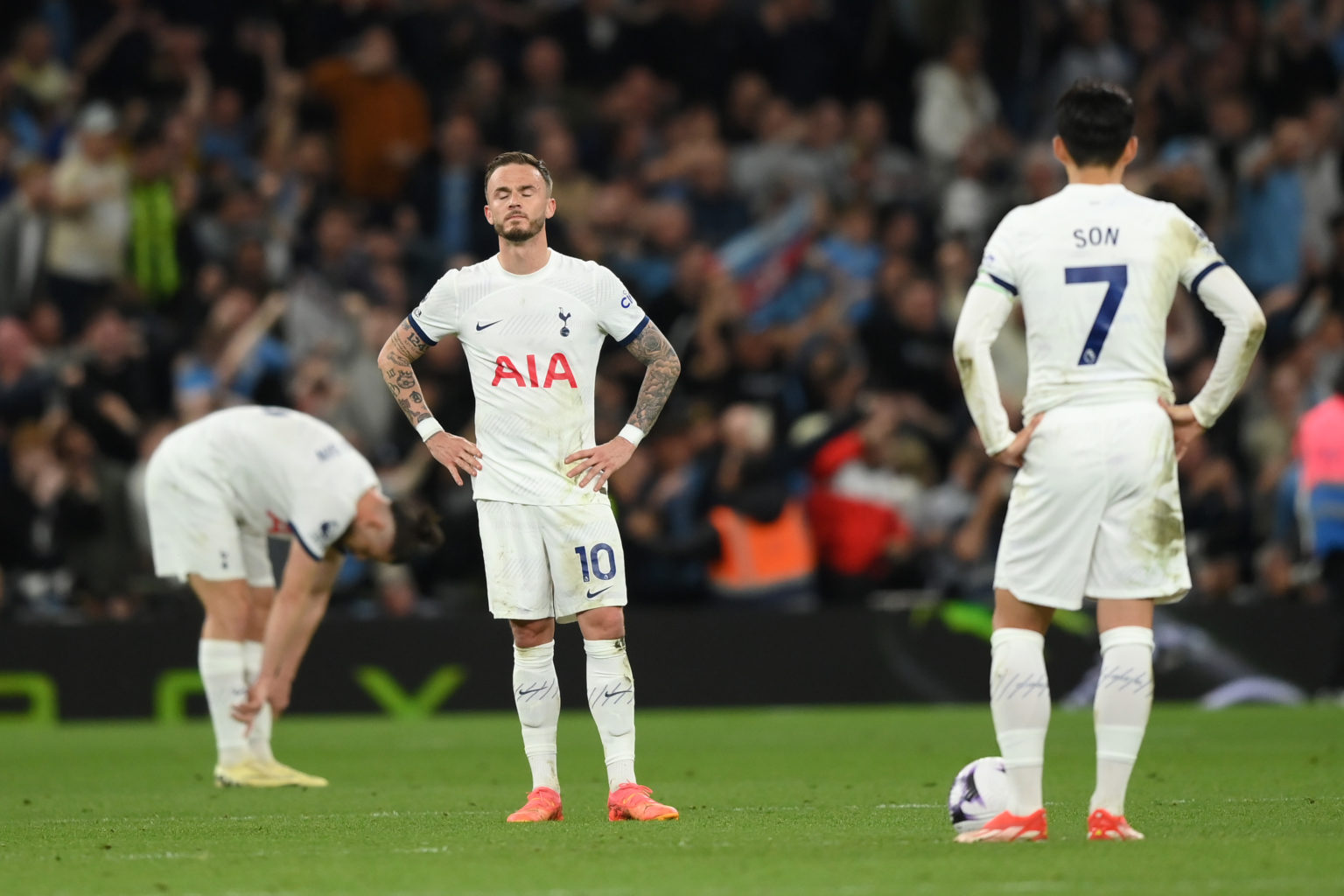 James Maddison of Tottenham Hotspur looks dejected after Erling Haaland of Manchester City (not pictured) scores his team's first goal from a penal...