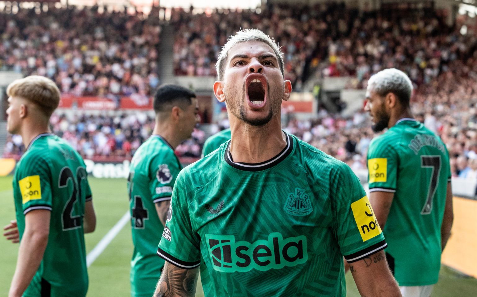 Newcastle United's Bruno Guimaraes celebrates scoring his side's fourth goal during the Premier League match between Brentford FC and Newcastle Uni...