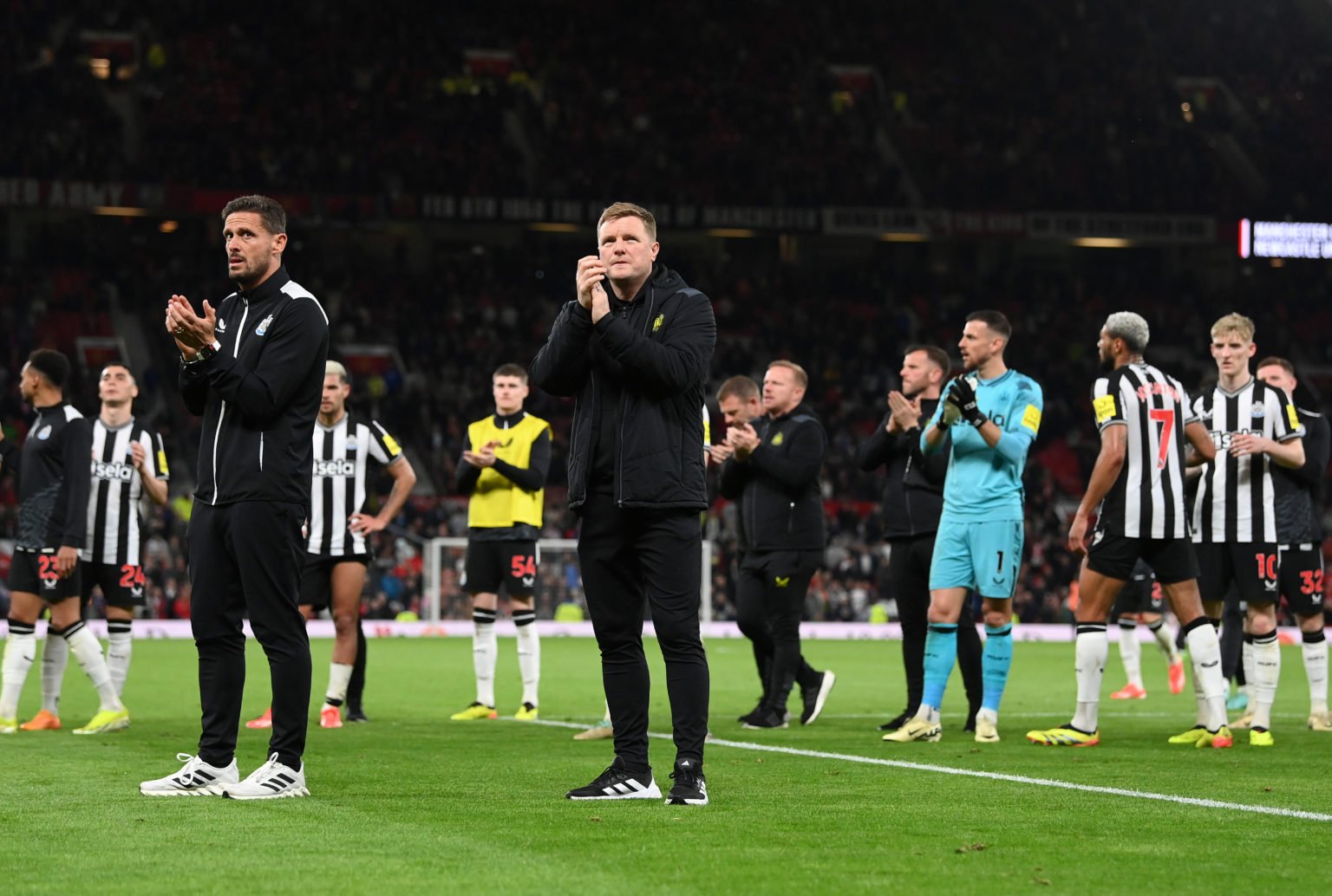 Newcastle United head coach Eddie Howe and players applaud the fans after the Premier League match between Manchester United and Newcastle United a...