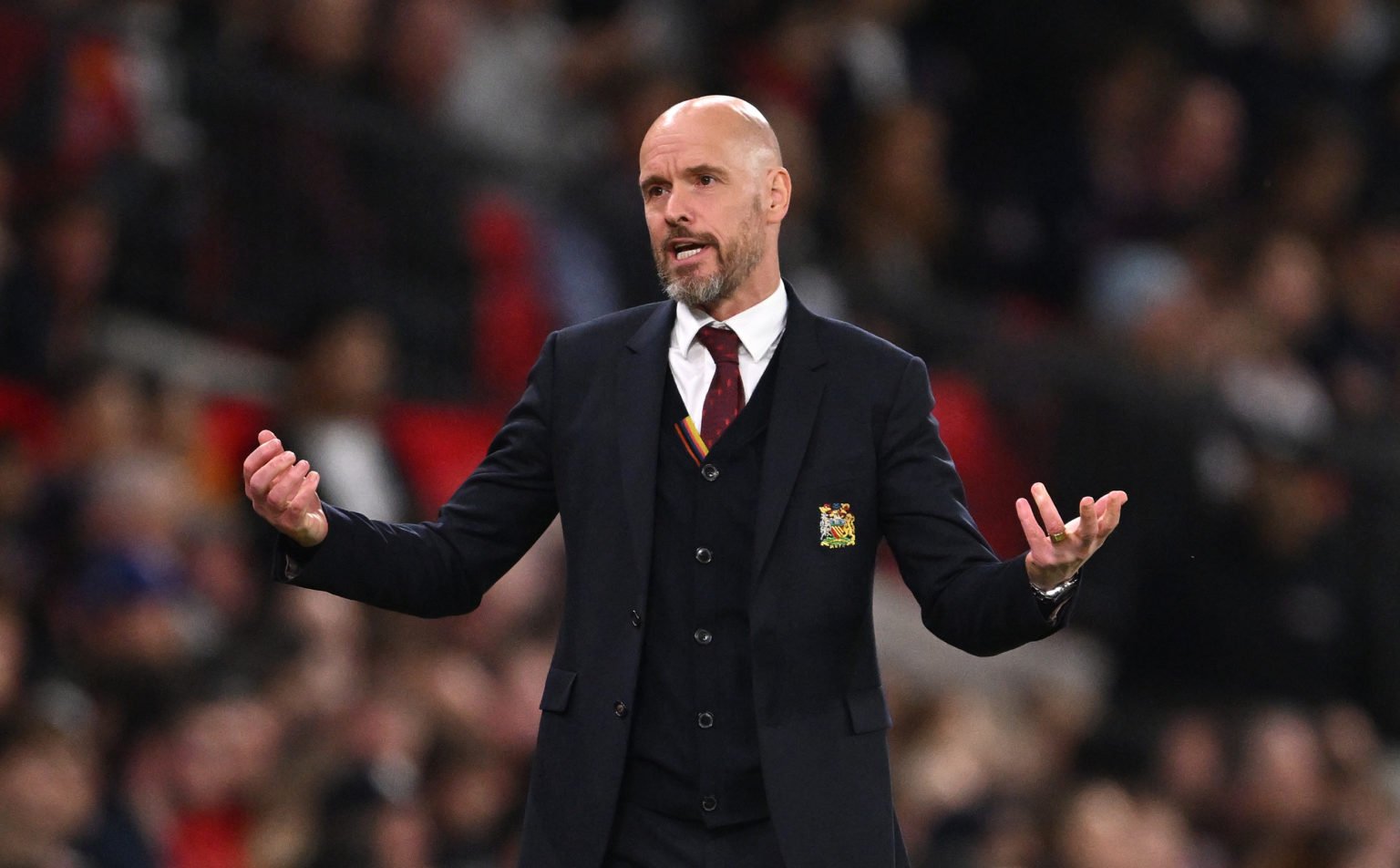 Manchester United manager Erik ten Hag reacts on the sidelines during the Premier League match between Manchester United and Newcastle United at Ol...