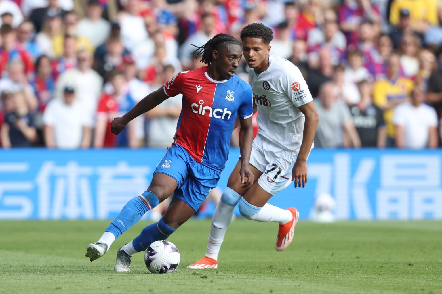 Crystal Palace's Eberechi Eze and Aston Villa's Omari Kellyman during the Premier League match between Crystal Palace and Aston Villa at Selhurst P...