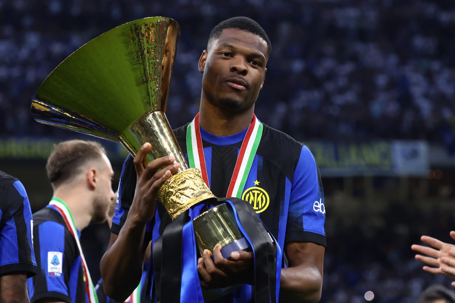 Denzel Dumfries of FC Internazionale celebrates the championship after the Serie A TIM match between FC Internazionale and SS Lazio at Stadio Giuse...