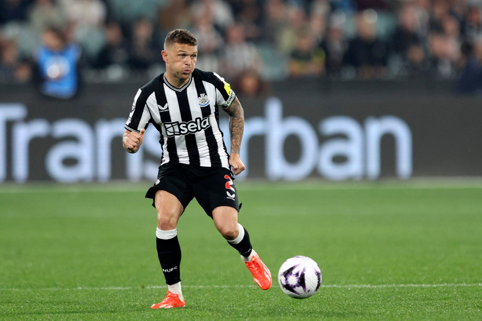 Newcastle United's Kieran Trippier controls the ball during the friendly football match between Newcastle United and Tottenham Hotspur at the Melbo...