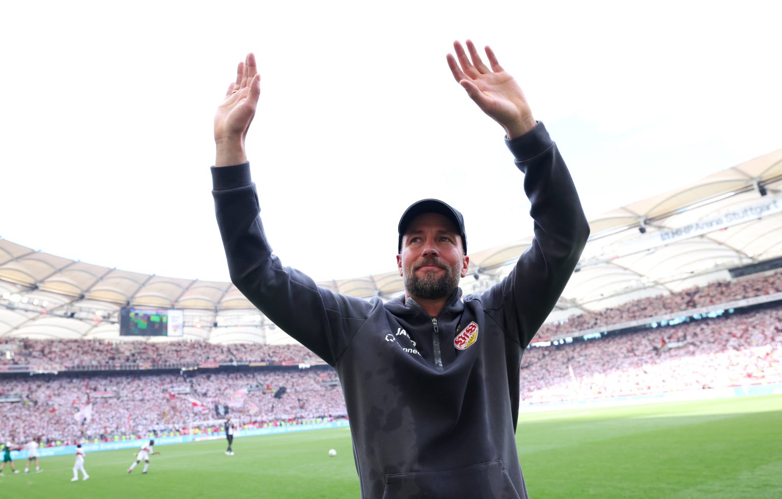 Sebastian Hoeness, Head Coach of VfB Stuttgart, acknowledges the fans after the team's victory in the Bundesliga match between VfB Stuttgart and Bo...