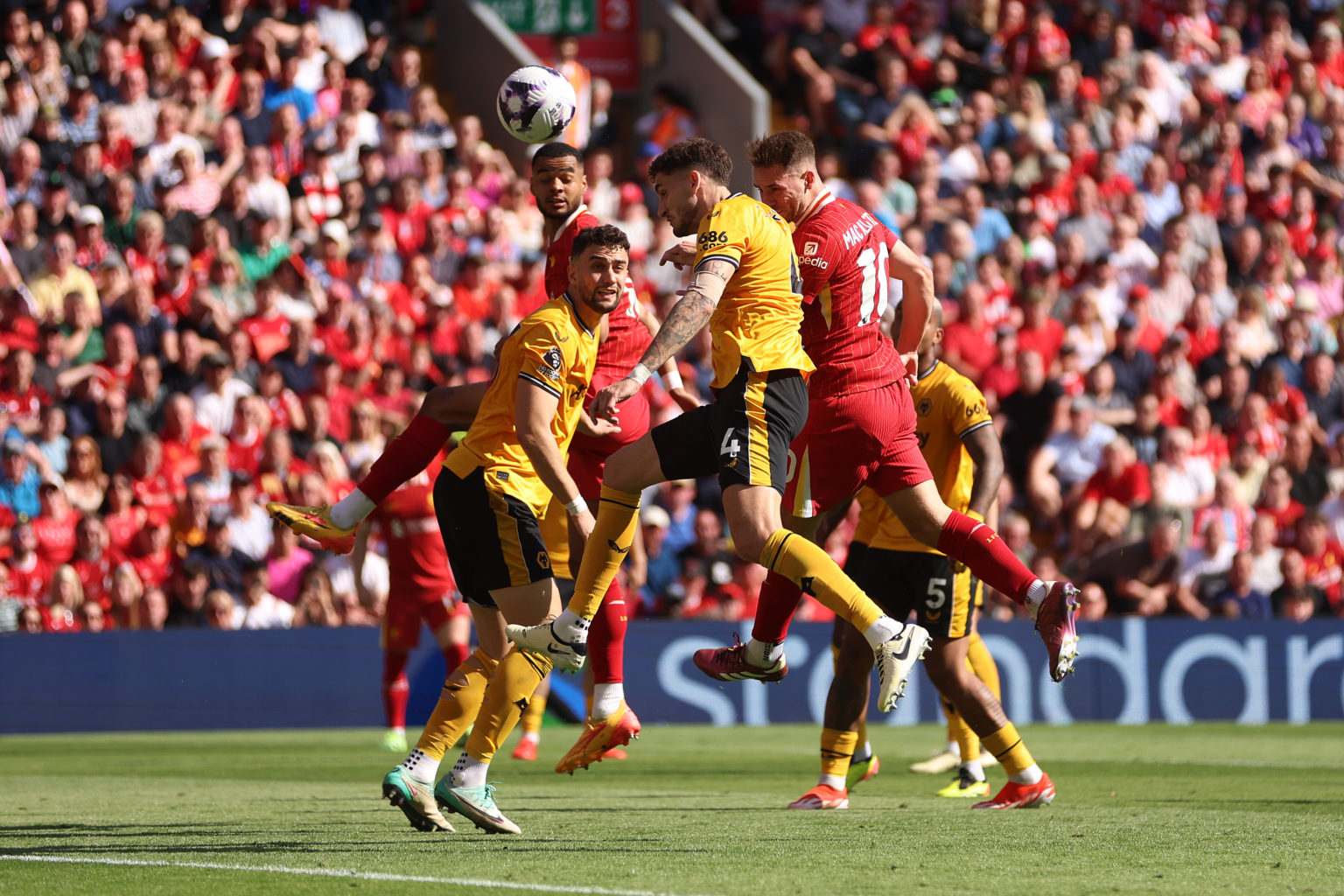 Alexis Mac Allister of Liverpool scores his team's first goal during the Premier League match between Liverpool FC and Wolverhampton Wanderers at A...