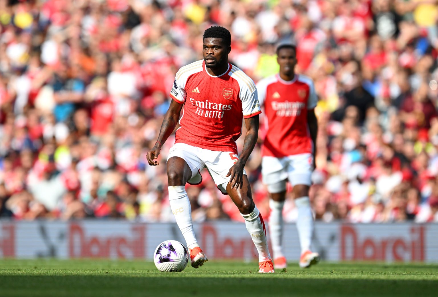 Thomas Partey of Arsenal controls the ball during the Premier League match between Arsenal FC and Everton FC at Emirates Stadium on May 19, 2024 in...