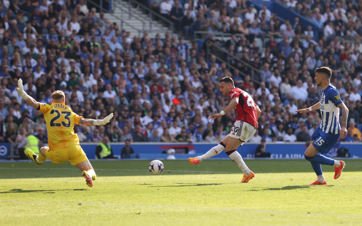 Diogo Dalot of Manchester United scores his team's first goal past Jason Steele of Brighton & Hove Albion during the Premier League match betwe...