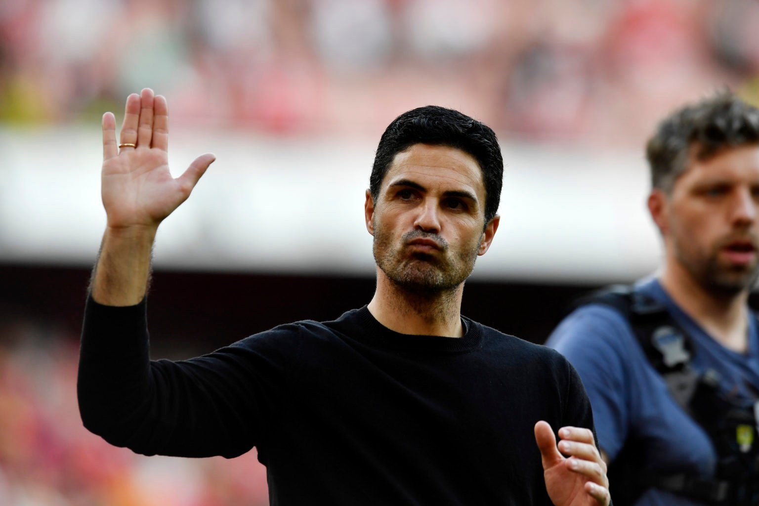 Mikel Arteta, Manager of Arsenal, acknowledges the fans following the Premier League match between Arsenal FC and Everton FC at Emirates Stadium on...