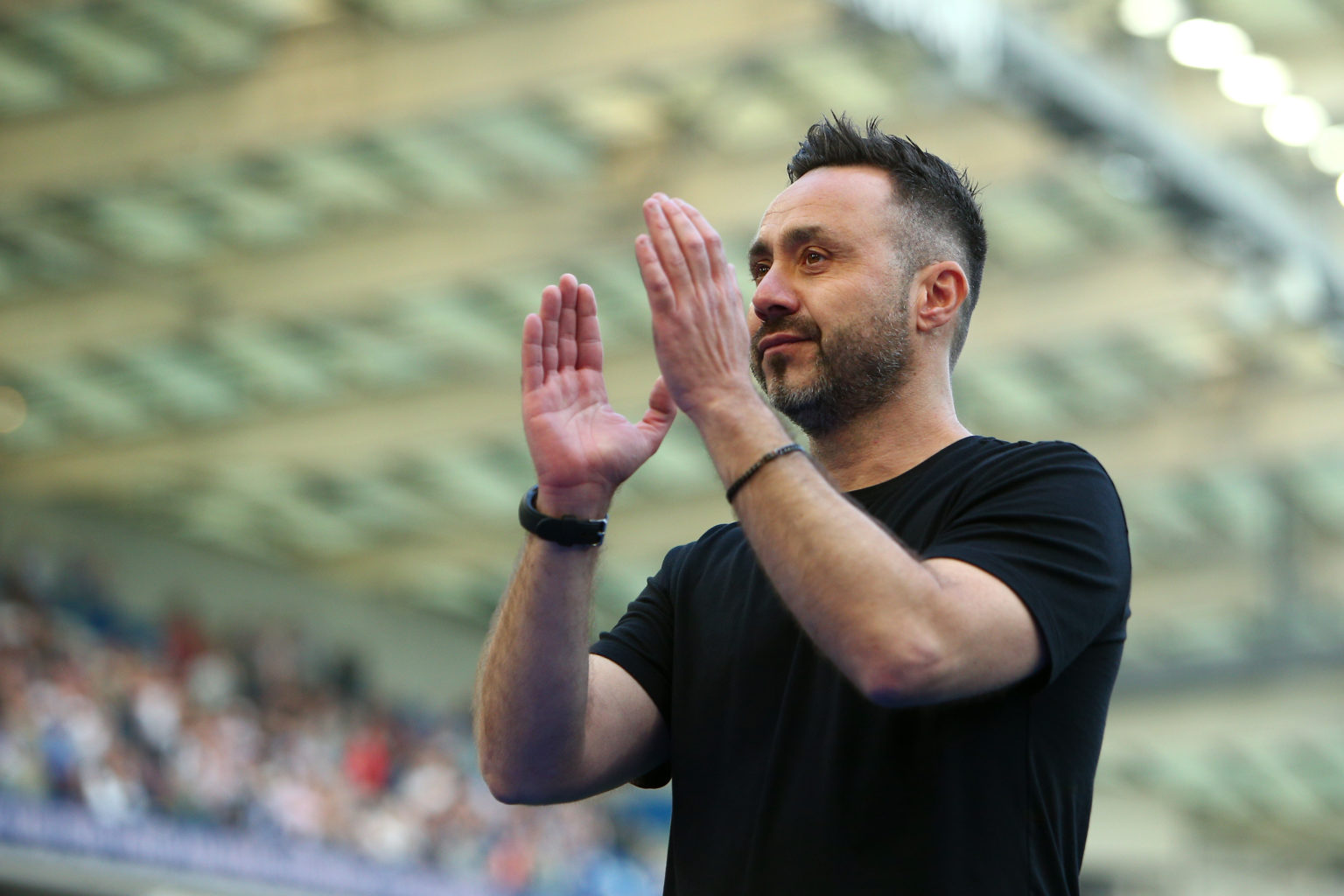 Roberto De Zerbi, Manager of Brighton & Hove Albion, acknowledges the fans following the Premier League match between Brighton & Hove Albio...