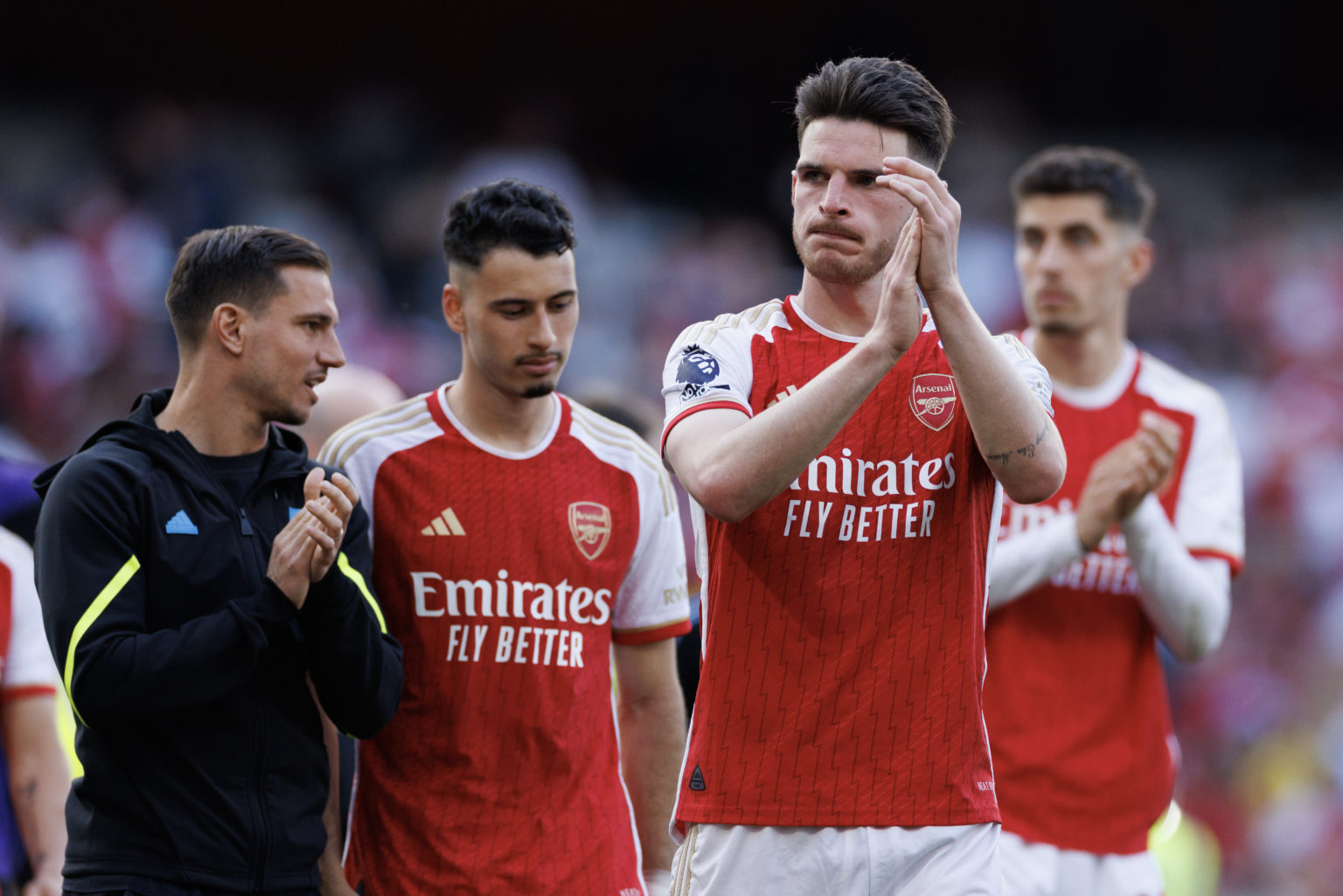 Declan Rice, Gabriel Martinelli and Kai Havertz of Arsenal look dejected after the Premier League match between Arsenal FC and Everton FC at Emirat...