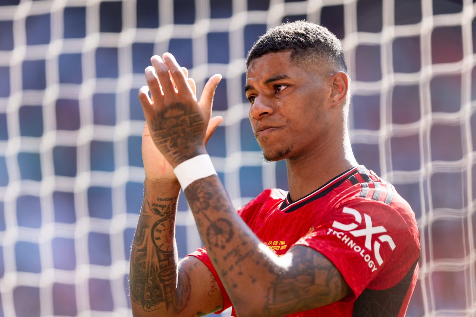 Marcus Rashford of Manchester United applauds the fans after their sides victory during the Emirates FA Cup Final match between Manchester City and...