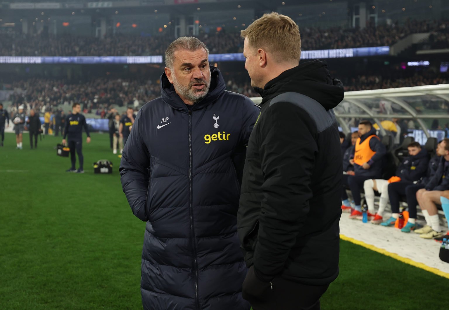 Ange Postecoglou, coach of Tottenham Hotspur speaks with Newcastle United FC coach, Eddie Howe during the exhibition match between Tottenham Hotspu...