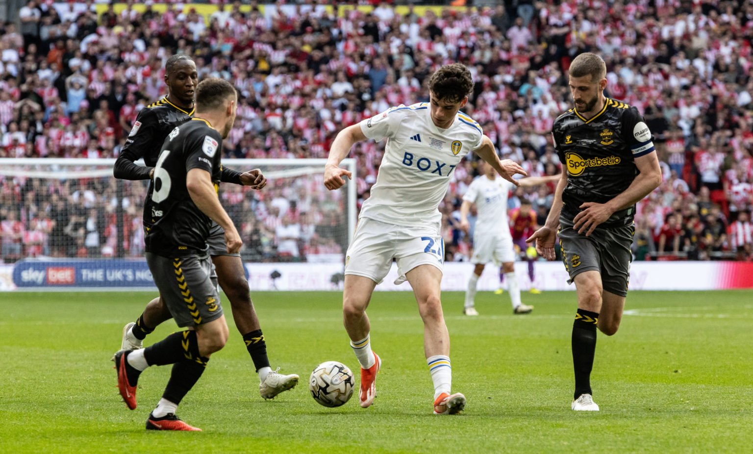 Leeds United's Archie Gray takes on the Southampton defence during the Sky Bet Championship Play-Off Final match between Leeds United and Southampt...